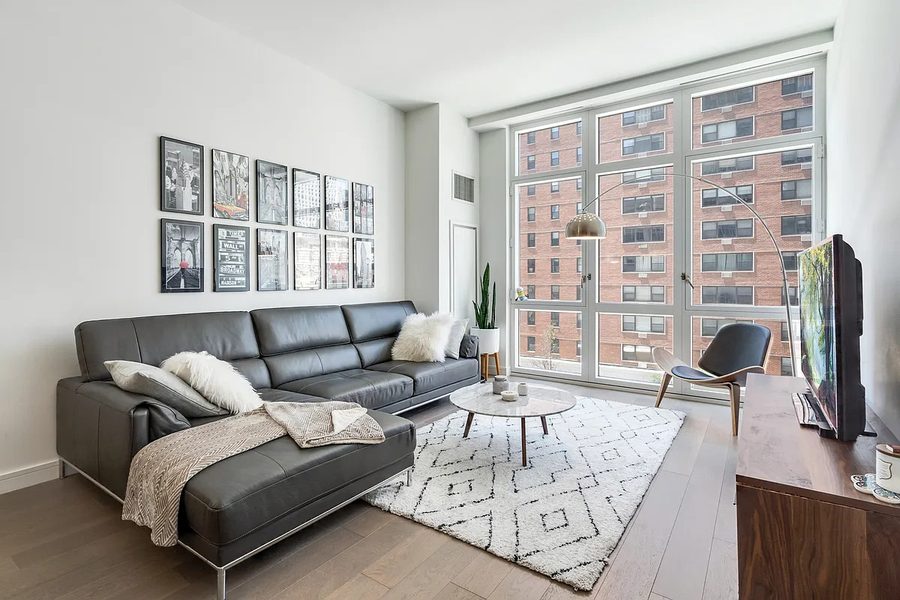 305 East 51st Street, Residence 4H &mdash; living room with floor-to-ceiling windows