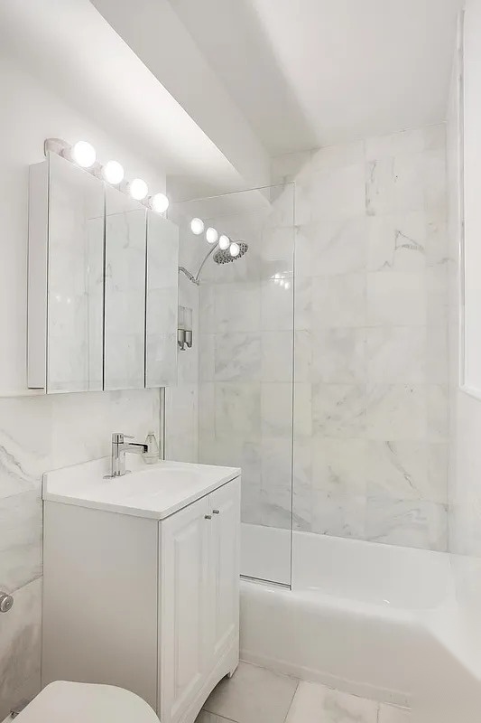 240 East 46th Street, #5A &mdash; Renovated bath in all-white marble
